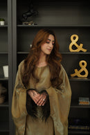 The Farha Feather Batwing Sleeve Maxi Dress is the dress of this year. Glimmer and sparkle with batwing long sleeve abaya maxi dress with feather detailing. Waist belt is tightened from the inside.