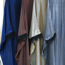 The Farha Feather Batwing Sleeve Maxi Dress is the dress of this year. Glimmer and sparkle with batwing long sleeve abaya maxi dress with feather detailing. Waist belt is tightened from the inside.