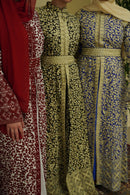 Our Bridal Floral Beaded Embroidered Palestinian Kaftan Thobe is a beautiful dress for your special occasion! It is luxerious, elegant and perfect for your Palestinian katib ktab or wedding. It is a dress with beautiful floral tatreez, embedded pearls and jewels and a tatreez belt that can be adjusted as you wish!