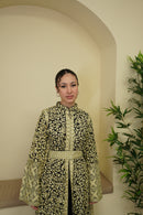 Our Bridal Floral Beaded Embroidered Palestinian Kaftan Thobe is a beautiful dress for your special occasion! It is luxerious, elegant and perfect for your Palestinian katib ktab or wedding. It is a dress with beautiful floral tatreez, embedded pearls and jewels and a tatreez belt that can be adjusted as you wish!