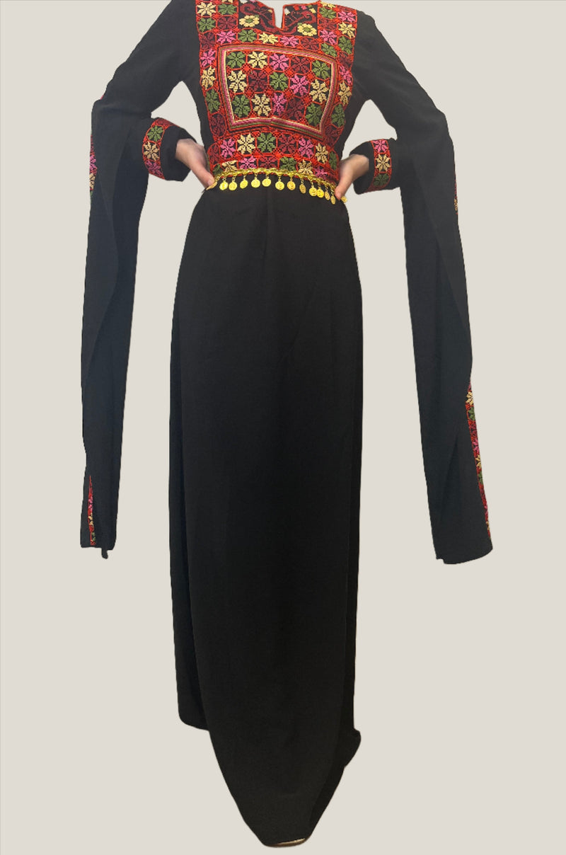 modern tatreez dress Excited to announce that @modestveencouture is now offering custom tatreez dresses! Our first creation is a stunning modern piece designed for an engagement photoshoot. This dress beautifully marries the rich tradition