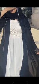 Make a lasting impression with this ephemeral ensemble from our latest collection, "Elham." 