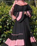 Look absolutely stunning in this frill abaya cardigan! You can style this with a slip dress or a top! 