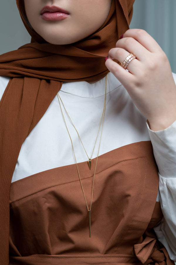 Model wears Gold Glorious Bar & Spike Necklace