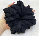 Our Volumizing Scrunchie adds the perfect amount of volume under your hijab and its style mimics the natural form of hair.