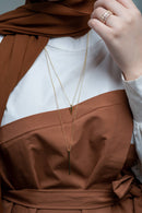 Model wearing Gold Glorious Bar & Spike Necklace