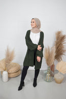 Woman in Nahda Fires Knit Cardigan green balloon sleeves