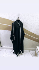 This premium textured black and white obsidian abaya is made from highest quality nidha sweat free fabric