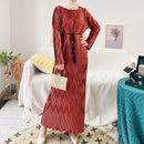 Class, elegance, and chic interest with this pleated wrinkle maxi dress with diamond design.