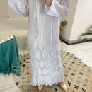 Class, elegance, and chic interest with this pleated wrinkle maxi dress with diamond design.