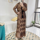 Class, elegance, and chic interest with this pleated wrinkle maxi dress with diamond design.