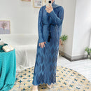 Class, elegance, and chic interest with this pleated wrinkle maxi dress with diamond design.