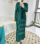 Class, elegance, and chic interest with this pleated wrinkle maxi dress with diamond design.