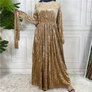 This beautiful pleated velvet dress is the perfect outfit for your next dinner, gathering, or party this fall winter season. 