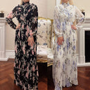 Summer is calling with this dress. This Floral Pleated Summer Dress is the fit for any occasion and event. Made of lined chiffon, it is lightweight while keeping you covered.