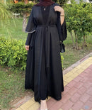 This kimono includes heavy hand work embroidery and delicately applied stone lace on premium black fabric.