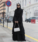 Grab this beautiful flared ruffle lace abaya! It is simple yet stylish.