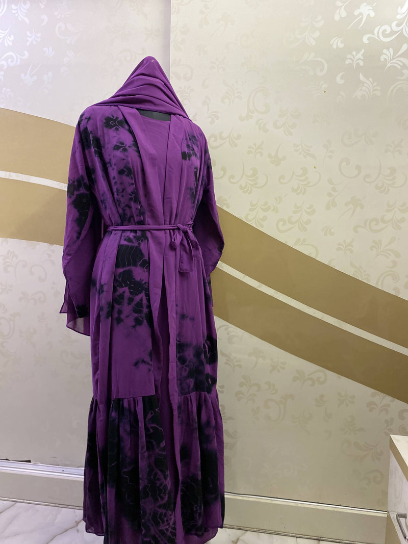 Comes with full sleeve nidha abaya, open tie-dye shrug, a belt, and a purple hijab.
