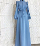 Lined with buttons and elegant cuff sleeves, this abaya dress is a must-have!