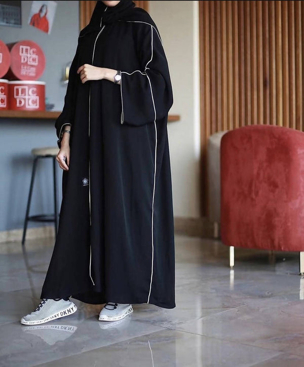 This premium textured black and white obsidian abaya is made from highest quality nidha sweat free fabric