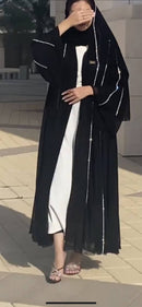 Make a lasting impression with this ephemeral ensemble from our latest collection, "Elham." 