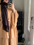 A lavish abaya, composed of 3 layers and frilled edges to add the perfect amount of texture and dimension to compliment all physiques