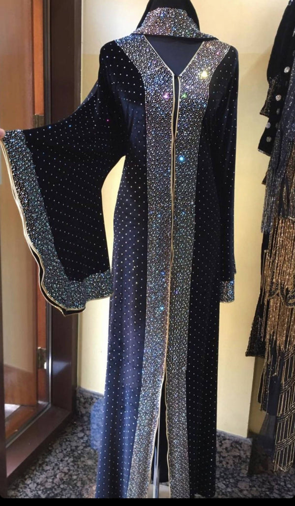 This artesian piece is heavily embroidered with a beautiful colour combination consisting of black and blue on a black fabric that is soft and luxurious.