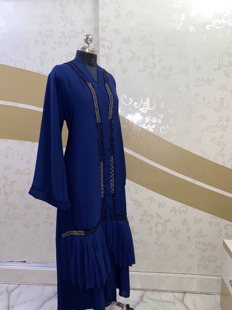 Blue zoom abaya with precise golden and black diamond work handcrafted carefully on premium zoom fabric, with frilled georgette in the bottom. 