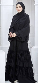 Grab this beautiful flared ruffle lace abaya! It is simple yet stylish.