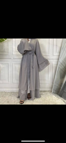 This lovely chiffon abaya features a longline two layer design with loose sleeves, and a comfortable and lightweight material. 