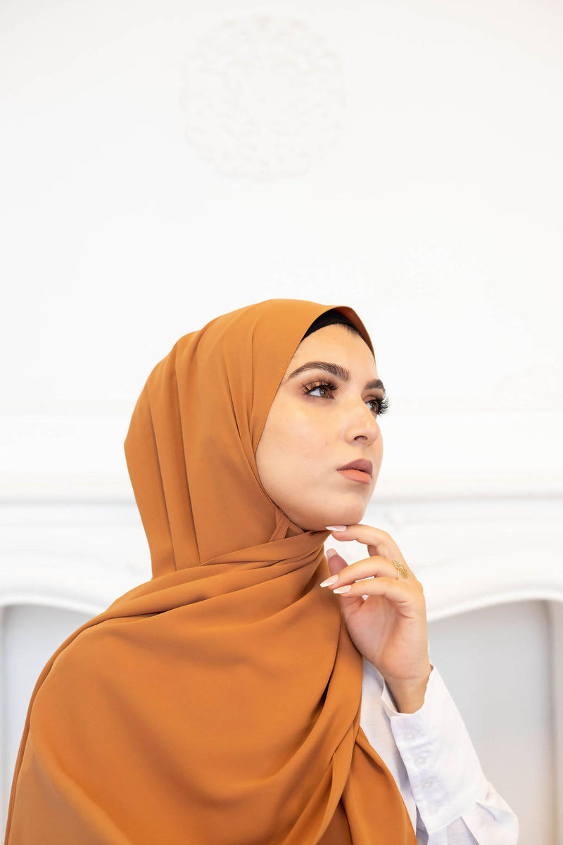 Woman wearing Medina Silk Hijab Mustard wrinkle free