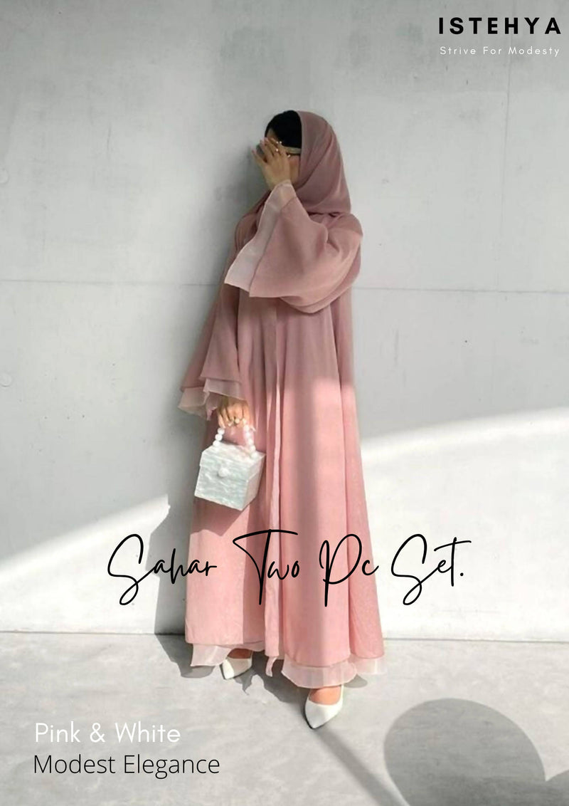 Classic and minimal, this blush pink and white 2-in-1 abaya features layered sleeves and is Ideal for special occasions, such as Eid, Nikah, or a casual evening out