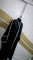 This premium textured black and white obsidian abaya is made from highest quality nidha sweat free fabric