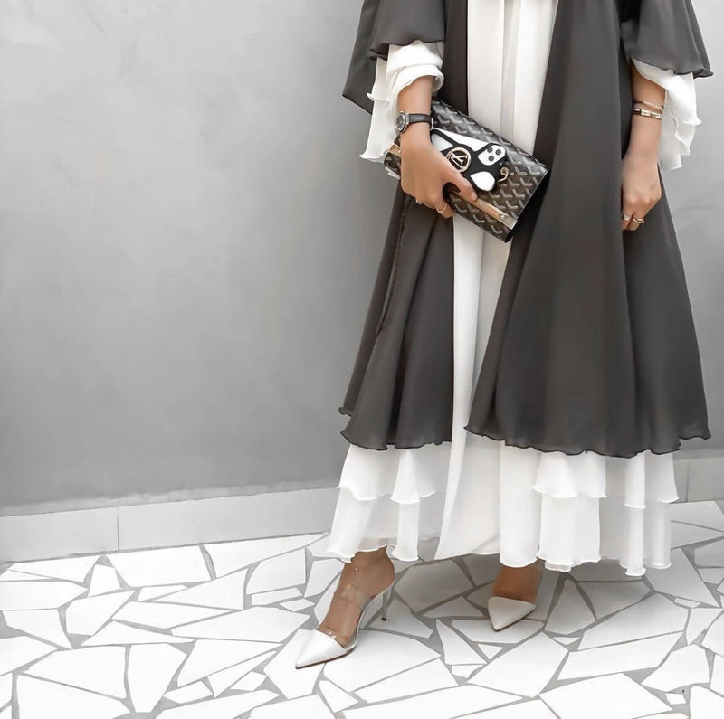 Intricate grey in ivory on a chiffon canvas creates an awe-inspiring look.