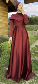 an incredibly flattering V-neck dress with long sleeves, made of premium satin nida. 