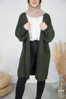 Woman wears Nadha Fares Knit Cardigan green